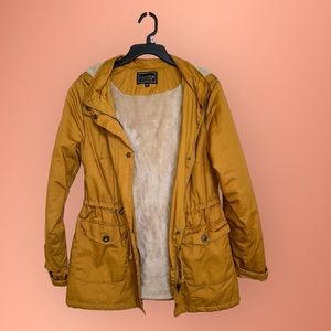 C’est Toi mustard colored jacket